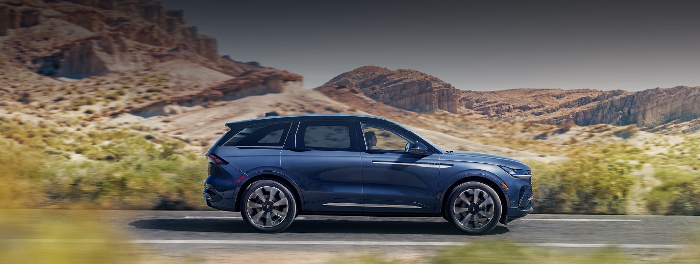 A 2024 Lincoln Nautilus® SUV is being driven in a desert setting. | Holmes Tuttle Lincoln in Tucson AZ