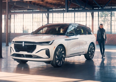 A person approaches a 2024 Lincoln Nautilus® SUV. | Holmes Tuttle Lincoln in Tucson AZ