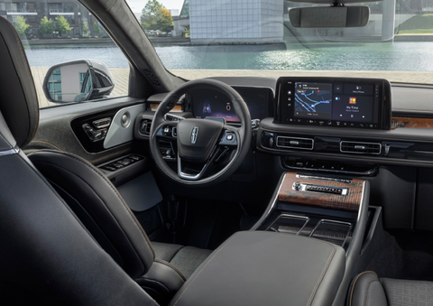 The interior of the 2025 Lincoln Aviator® SUV is shown parked with a view of a harbor through the windshield. | Holmes Tuttle Lincoln in Tucson AZ