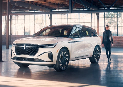 A person approaches a 2026 Lincoln Nautilus® SUV. | Holmes Tuttle Lincoln in Tucson AZ