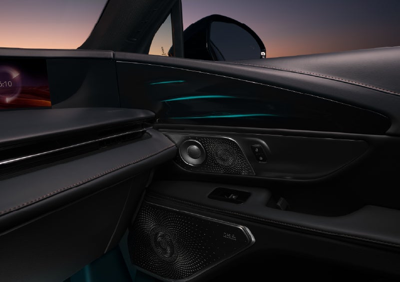 Selectable ambient lighting glows in the passenger door panel. | Holmes Tuttle Lincoln in Tucson AZ