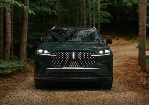 The front grille of a 2027 Lincoln Aviator® Black Label™ SUV is shown. | Holmes Tuttle Lincoln in Tucson AZ